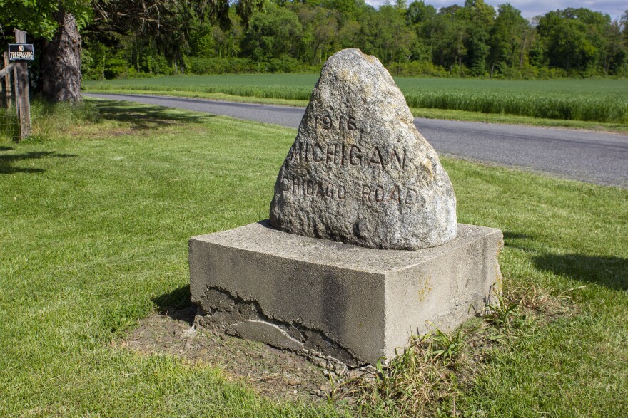 This stone border marker sits next to the Chicago Trail highway on the border between St. Joseph County, Indiana and Berrien County, Michigan. It was most likely added by a different survey — probably related to the road — in 1916.