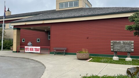 A "Vote Here Today" sign outside Unalaska City Hall, the island's only polling location, on Aug. 18, 2026.