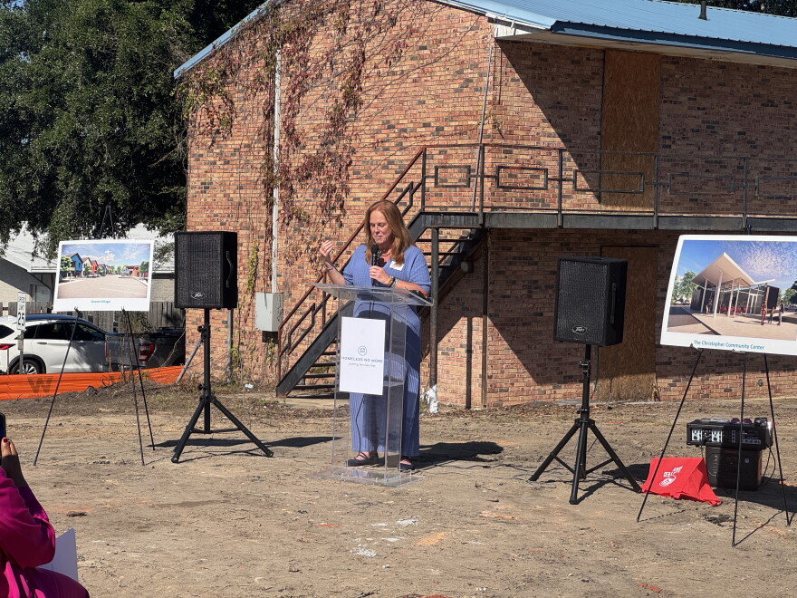 Homeless No More President and CEO Lila Anna Sauls speaks at the Grand Village groundbreaking ceremony on Oct. 13.