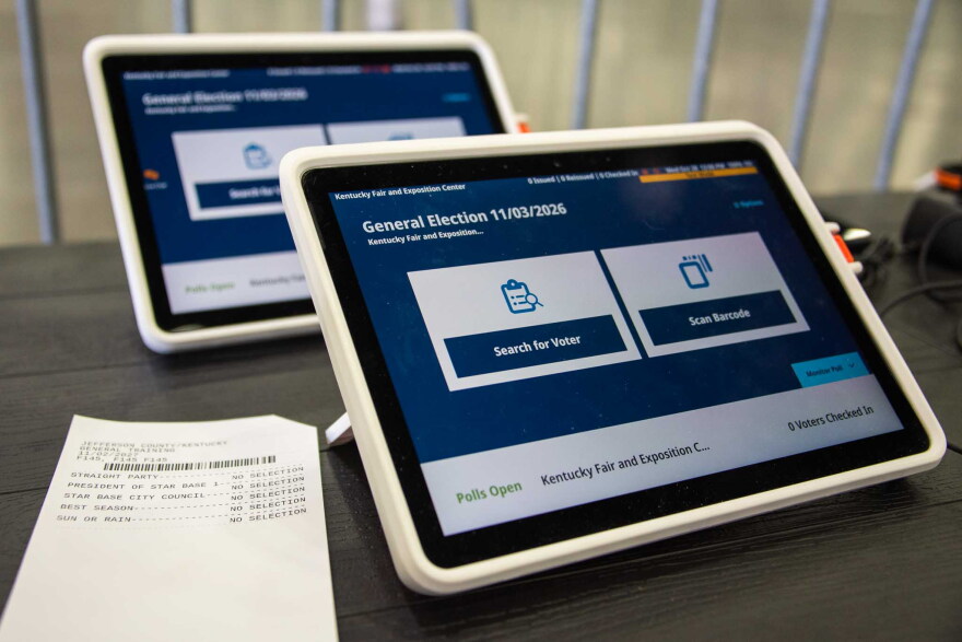 A tablet sits ready for voters at Louisville's first drive-through voting center, opening during the 2026 General Election, located at the Kentucky Expo Center.