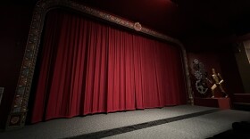A red curtain hides the movie screen at Screenland Armour. 