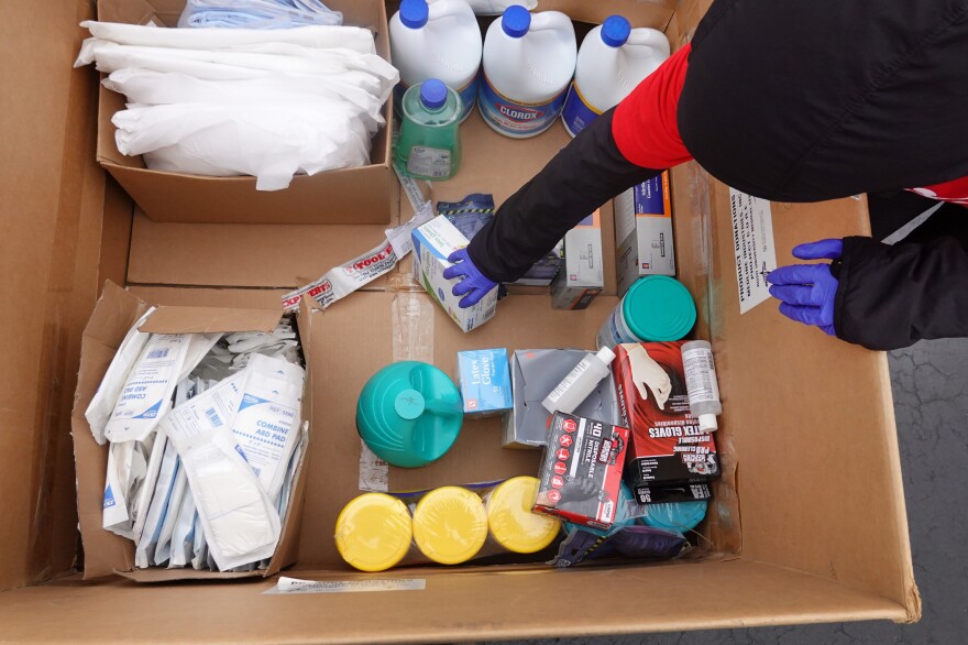 Staff and volunteers with Project CURE held a drive outside the United Center in Chicago to collect donations of personal protective equipment from the community that were then used to supply hospitals and clinics experiencing shortages on March 29.