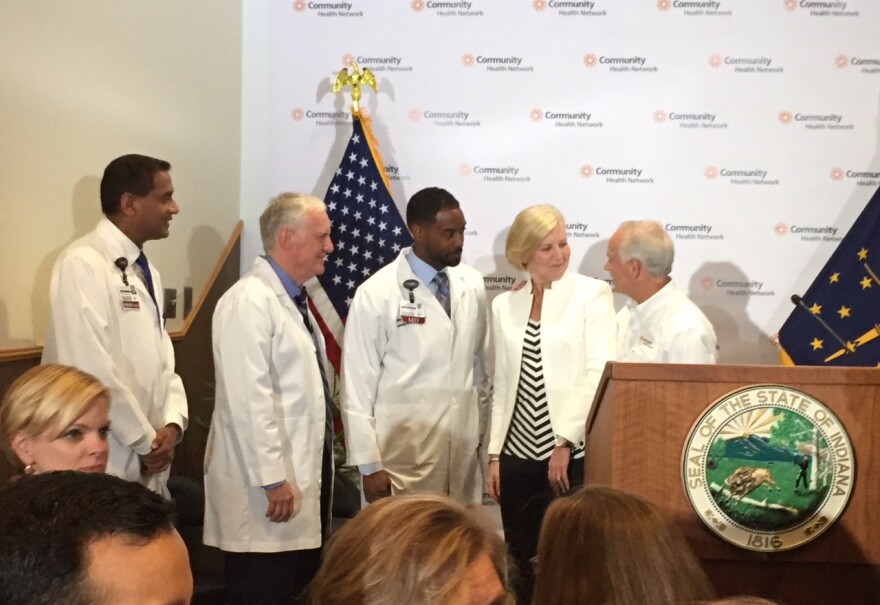 Community Health leaders join state officials for an announcement about the neonatal program.