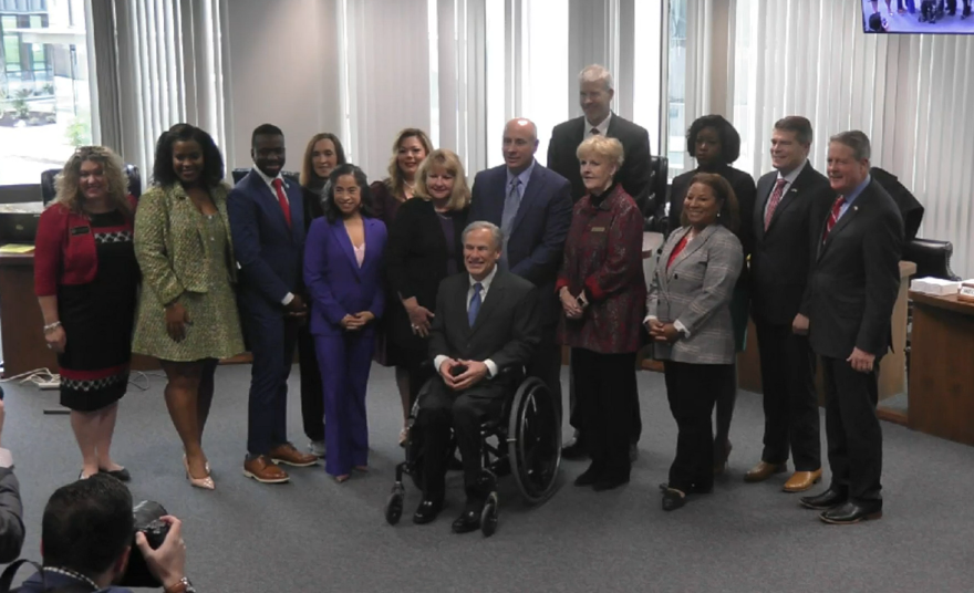 Members of the Texas State Board of Education pose for a photo with Gov. Greg Abbott on February 3, 2023 after being sworn in for a new term.  