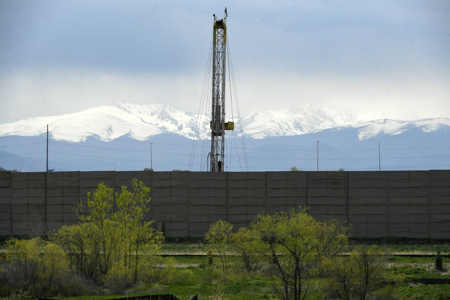 THORNTON, COLORADO - MAY 19: The drilling rig at the Ivey Pad site is visible from miles away on May 19, 2021 in Thornton, Colorado.The Ivey Pad site in Adams County is operated by Great Western Petroleum. The company calls it their very first GREEN platinum facility. The site opened in November 2020. The pad is moving into the fourth phase of operations: Completions. Green stands for Globally Reduced Emissions and Extraction Network. Great Western has been deemed the site a platinum facility through its green initiative which they say is an integrated process for managing field locations that highlight areas of sustainability. (Photo by Helen H. Richardson/The Denver Post)