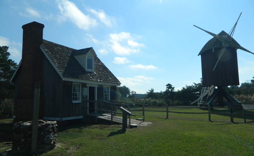 The Spocott property with Adaline Wheatly's cottage in the foreground and windmill in the background.