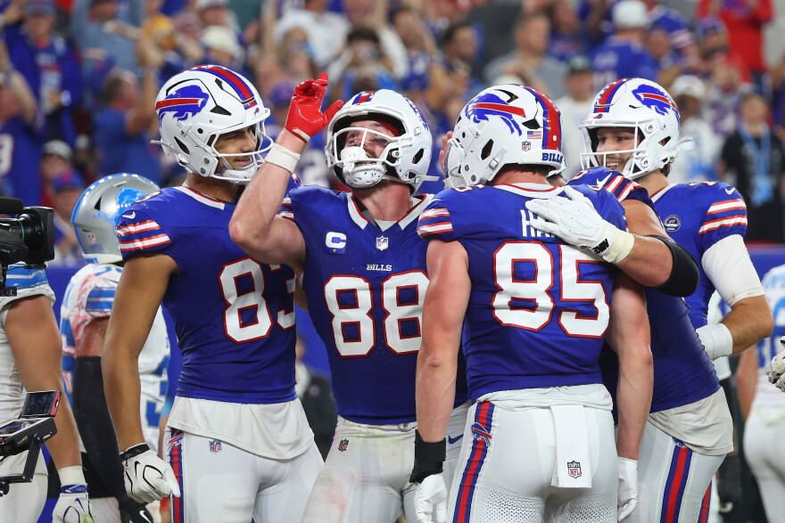 Buffalo Bills tight end Dawson Knox (88) celebrates his touchdown reception against the Detroit Lions during the first half of an NFL football game in Orchard Park, N.Y., Thursday, Sept. 17, 2026.