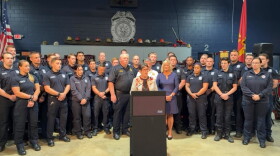 Lexington Mayor Linda Gorton and fire fighters who will receive emergency medical training