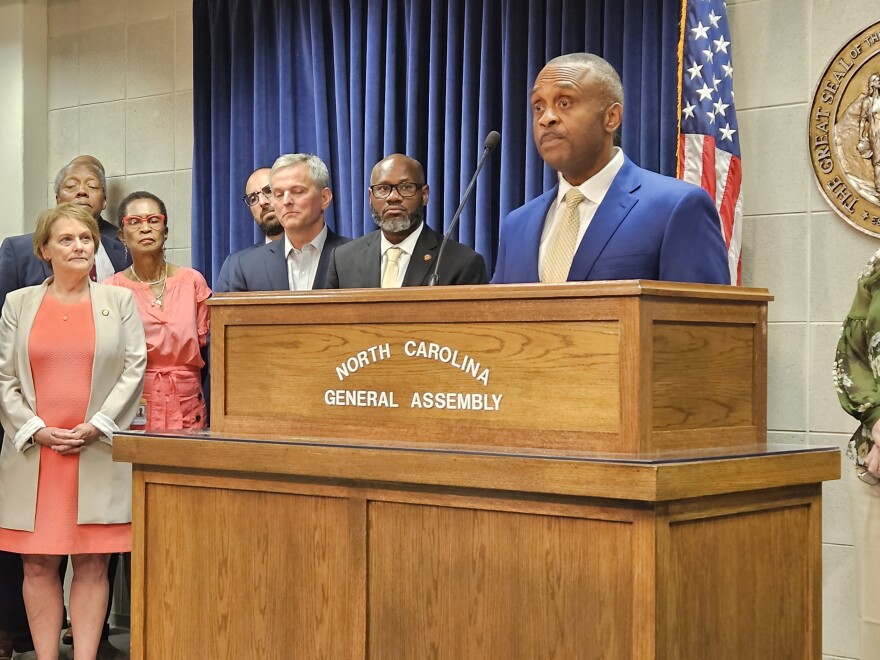 House Democratic Leader Robert Reives, right, joined other House Democrats and Attorney General Josh Stein for a news conference Wednesday criticizing Republican budget delays.