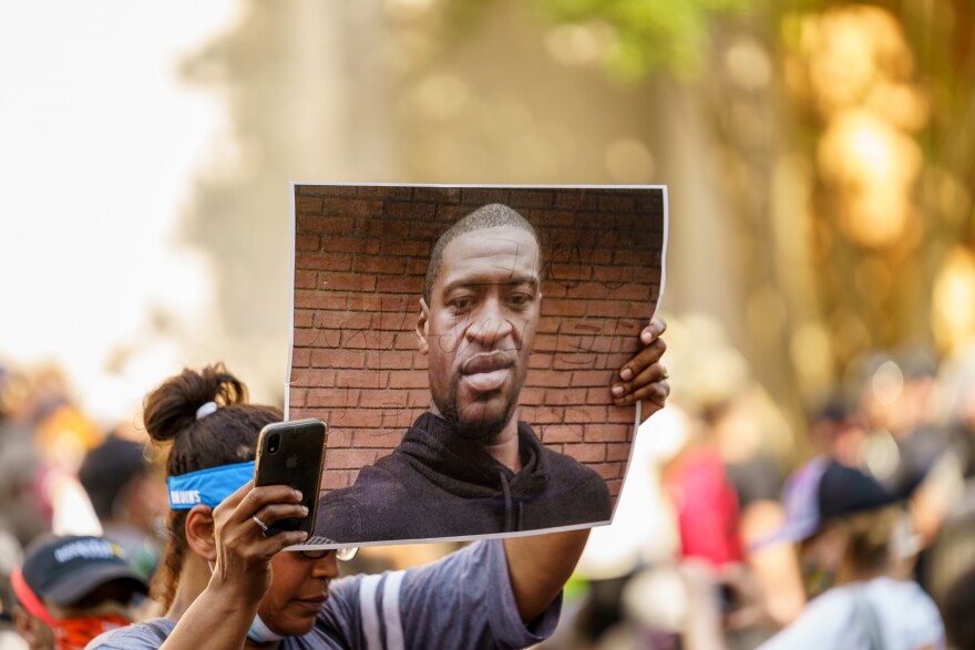 Demonstrators gather in Washington, DC in memory of George Floyd in June 2020. [bgrocker/Shutterstock]