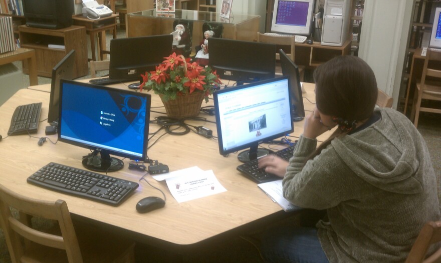 Rachel Vaughn, of Cooper, browses the internet on one of the new computers recently installed at the Commerce Public Library.