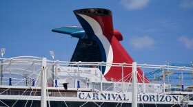 FILE - Carnival Cruise Line's Carnival Horizon cruise ship is shown docked at PortMiami, April 9, 2021, in Miami. (AP Photo/Wilfredo Lee, file)