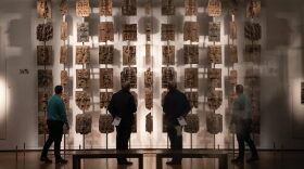Plaques that form part of the Benin Bronzes are displayed at The British Museum in London. The Bronzes were stolen from the African country of Benin by British troops in 1897. 