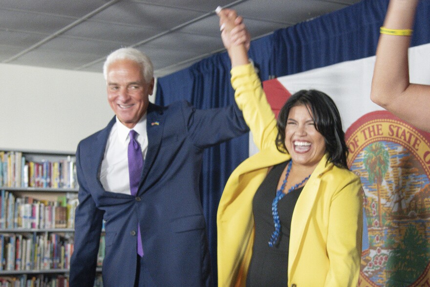 U.S. Rep. Charlie Crist celebrates as he announces his running mate Karla Hernández-Mats at Hialeah Middle School in Hialeah, Fla., Saturday Aug. 27, 2022 as he challenges Republican Gov. Ron DeSantis in November (AP Photo/Gaston De Cardenas)