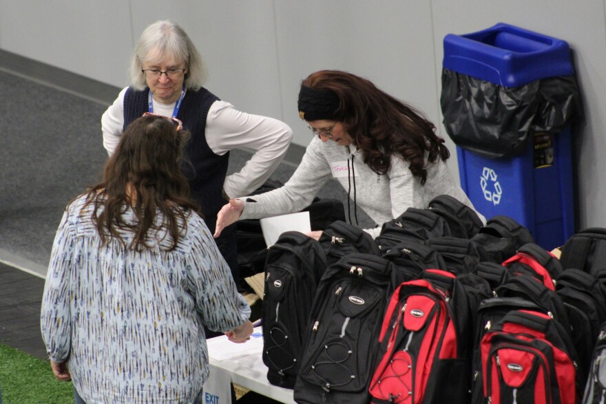 Kathy Gensel (rear left) helps coordinate the 2026 Project Homeless Connect event on Tuesday, Jan. 27, 2026 in Soldotna, Alaska.