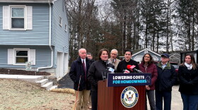 Coventry resident Kristen Kane at her home that was impacted by the crumbling foundation issue. This program is for gap funding, paying for expenses related to the foundation repair not the repair itself.