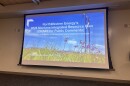 A slide on a screen at a NorthWestern Energy public comment session in Missoula, MT on Jan. 28, 2026.