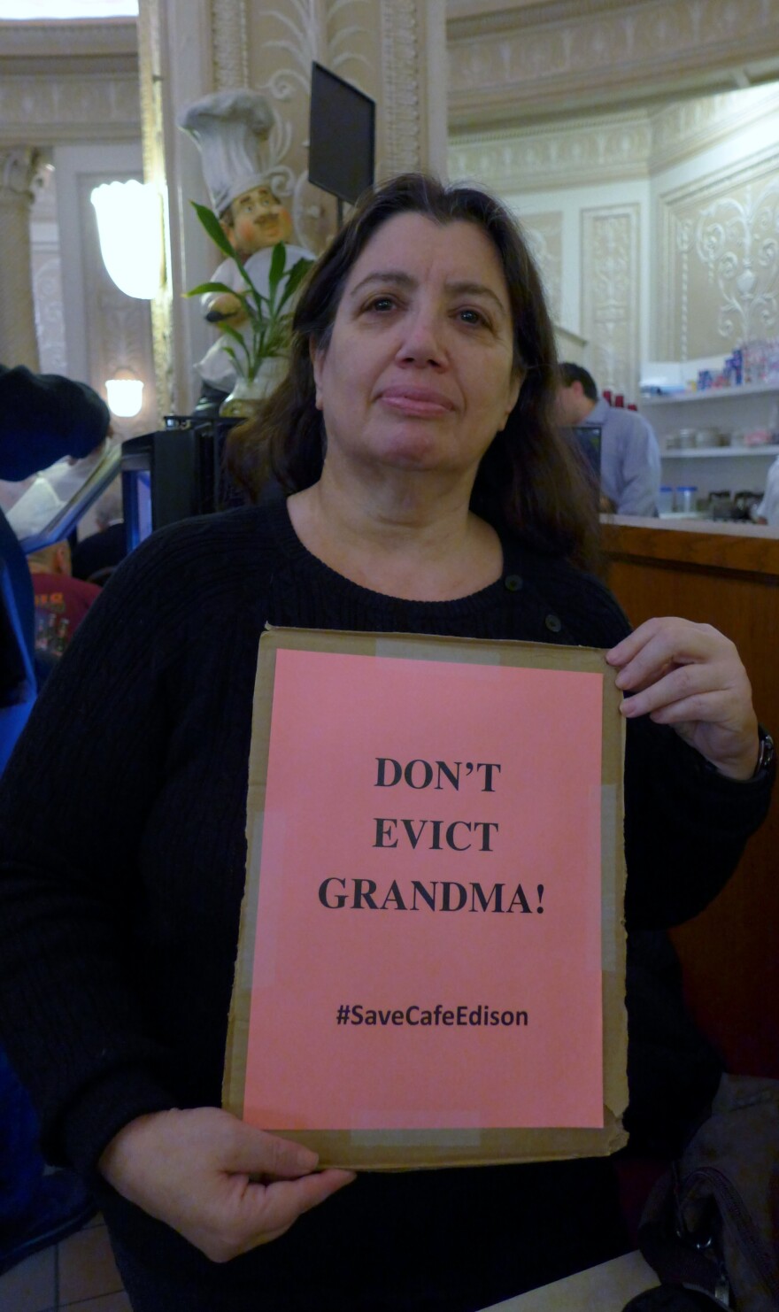"Lunch mobber" Barbara Nassberg protests the planned closure of the Café Edison to make way for a more upscale restaurant.