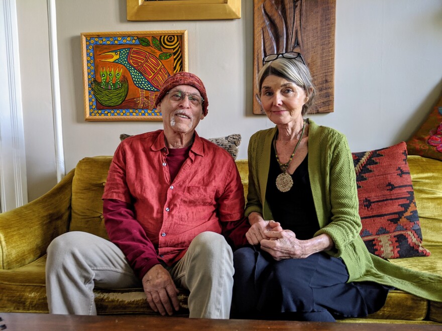 Wolf advocate Larry Weiss and his partner, Janet, at their home in Denver. Weiss says voters should make the big decisions rather than trusting biologists at state wildlife agencies.
