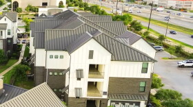 Swimming pool spa in new development apartment complex with metal roofing, siding near Interstate Highway I-35, fast growing area Pflugerville northeast of downtown Austin, Texas, housing marke