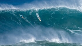 Luke Shepardson, 27, takes on a large wave at Waimea Bay on Jan. 22, 2023.