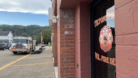 A firetruck sits parallel to the Tiltonsville Volunteer Fire Department. 