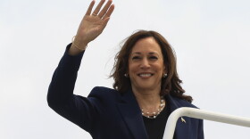 Vice President Kamala Harris waves as she boards Air Force Two following a campaign event, in Milwaukee, Wis., Tuesday, July 23, 2024. (Kevin Mohatt/Pool via AP)
