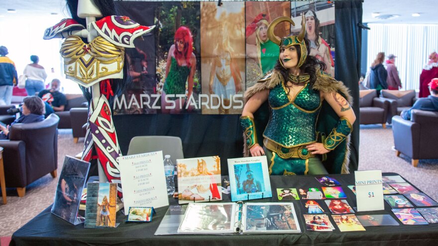 A women dressed in costume at a comic con event