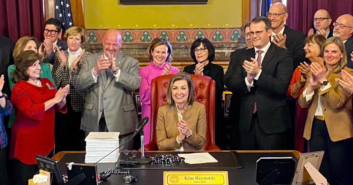 Iowa governor signs 1,500-page government reorganization plan into law ...