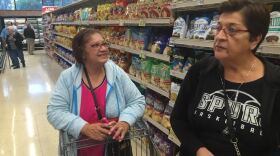 File photo: Shoppers buy food at the newly opened H-E-B on South Flores Street in San Antonio on Dec. 2, 2015.