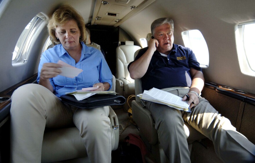 Mississippi Gov. Haley Barbour and his wife, Marsha Barbour, prepare to meet with President Bush in Gulfport on Sept. 12, 2005. Katrina made landfall on the Mississippi coast, site of some of the worst damage from the storm.