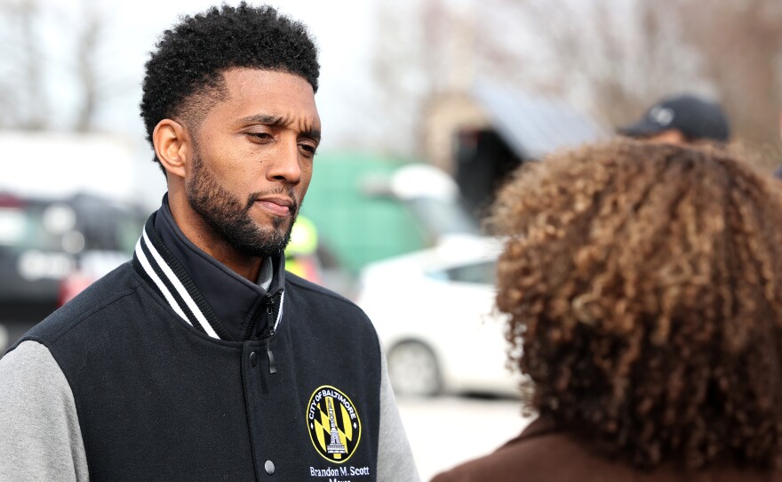 Baltimore Mayor Brandon Scott talks with the media on Tuesday.