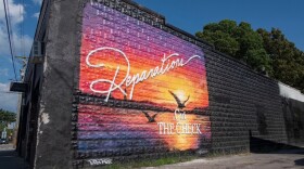 A pro-reparations mural in West Asheville.