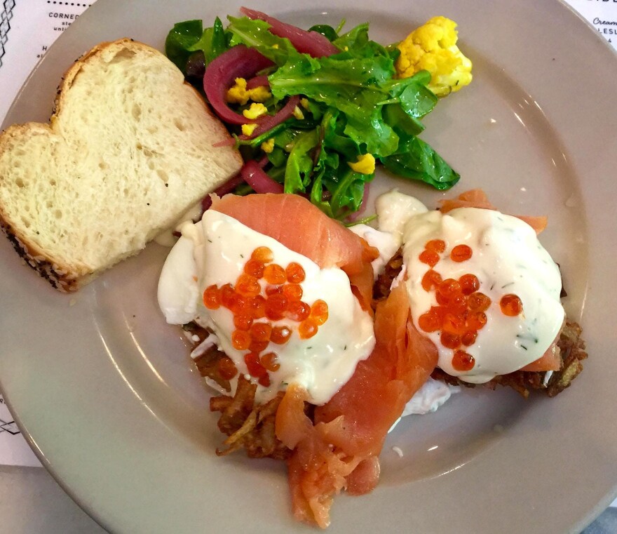 The Benny Goodman at Perly's Restaurant and Deli in Richmond, Va.: two latkes (potato pancakes) topped with smoked salmon, poached eggs, dull hollandaise and salmon roe. (Kathy Gunst for Here & Now)