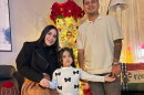 Ydienays Dominguez with her daughter Zoeh and her husband Anderson.