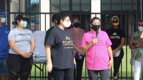 Translator Grace Ambrossi and NOLA Public Schools parent Mayra Jucup at a press conference on July 20, 2020. 