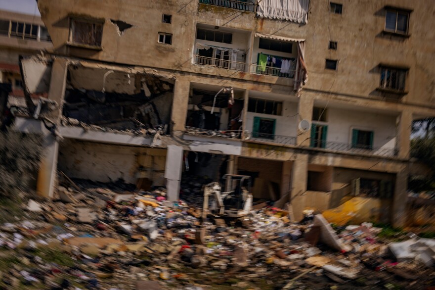 Amid the devastation, a young boy, initially reported missing, was found alive under the rubble by rescue teams in Nabatieh, Lebanon, after an Israeli airstrike the night of Feb. 14.