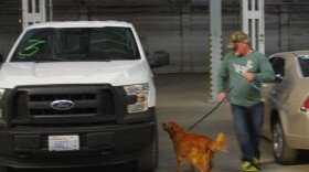 Officer Darrell Lobe of the Bothell, Wash. police department "proofs" a hidden-drugs test at the start of a K9 certification. The location of drugs in the vehicles was determined by rolling a die to prevent bias.