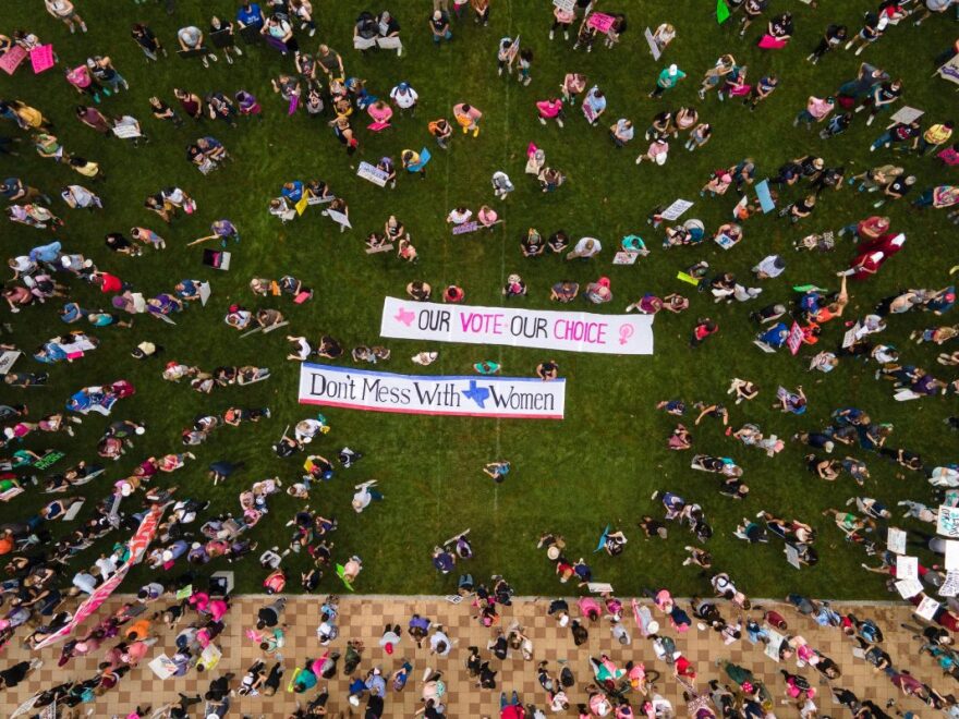 Thousands gathered at Discovery Green before marching to Houston City Hall on Oct. 2, 2021.