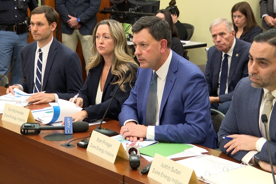 Duke Energy Indiana president Stan Pinegar and other company executives at an IURC hearing.