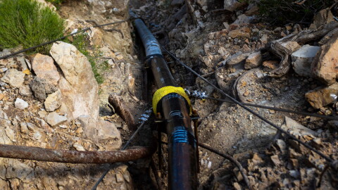 FILE - A section of pipeline that brings water to the South Rim of Grand Canyon National Park is seen below Bright Angel Lodge in Arizona, Aug. 30, 2024.