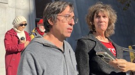 Guido Reichstadter and Wynd Kaufmyn stand outside of the Bryant St. courthouse on 11/21/25