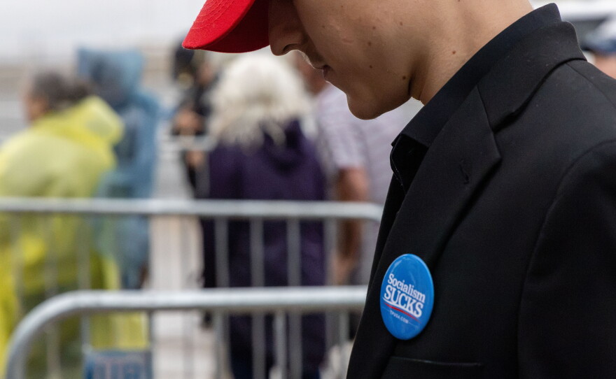 Attendees braved persistent rain at a Donald Trump Rally in Durant on Oct. 1, 2026.