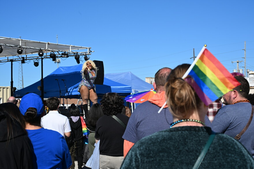 Drag performer Venus Rising performs on stage to a crowd of avid supporters at Tulsa Pride.