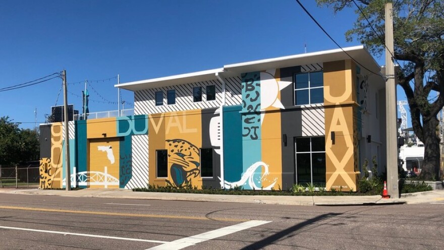 The headquarters of Emerald C. Development Inc. includes a mural featuring Jacksonville and the Jaguars.