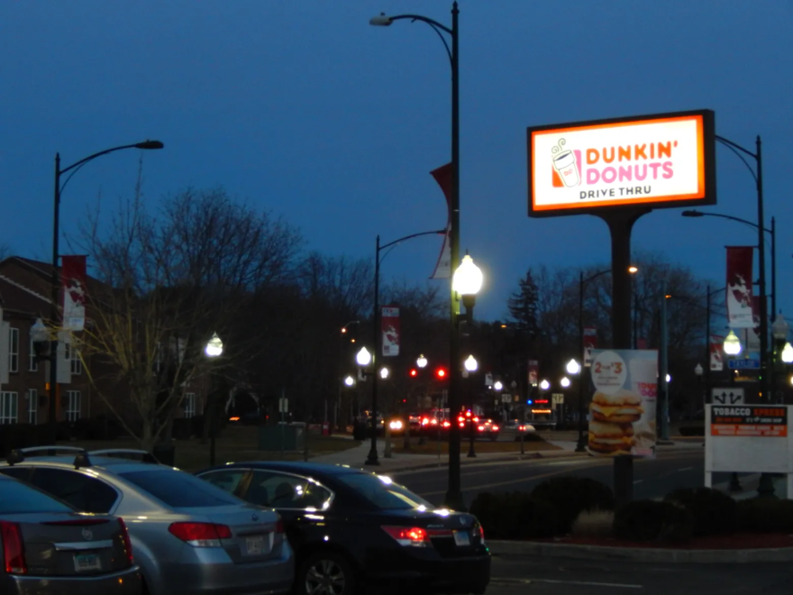 A Dunkin' Donuts sits near the town green in downtown East Haven.