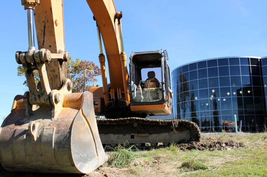 No golden shovels here: BU's Center for Excellence groundbreaking was so big it got a bulldozer.