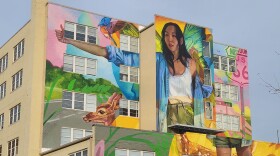 A mural on a downtown Springfield, Mo. building (photo taken November 10, 2025).