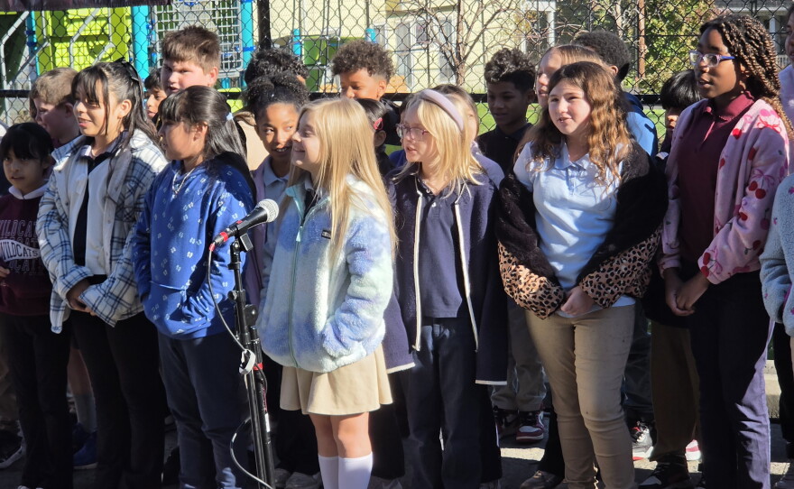Fourth-grade students at Whittier Elementary in Scranton sing "The Star-Spangled Banner" on Tuesday.