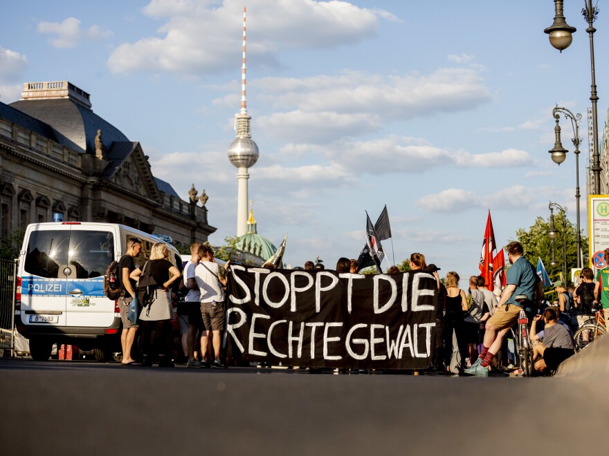 Demonstrators hold a banner with the message "Stop the Right-Wing Violence" during a June 18 march in Berlin against the killing of politician Walter Lübcke.